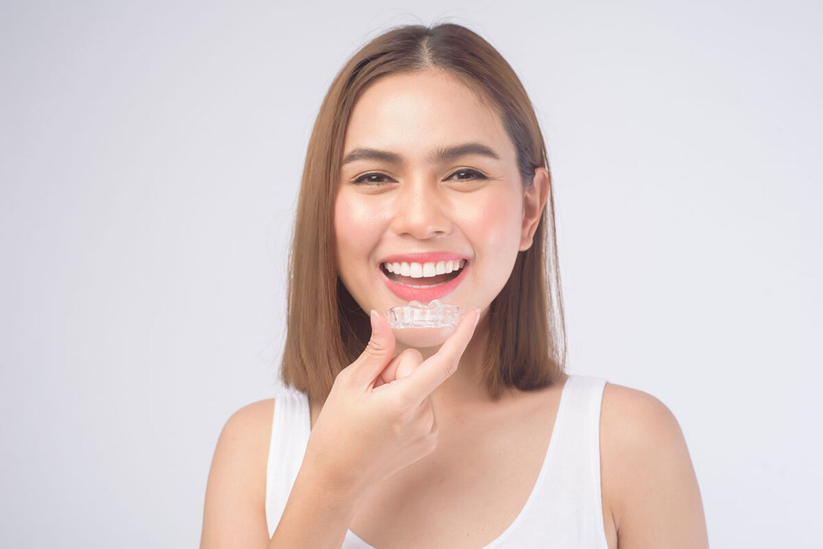 The Dental Symphony | How Clear Aligners Help Adults Achieve Straighter Smiles Without Traditional Braces