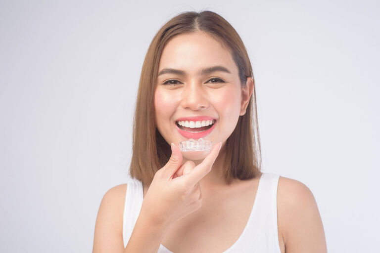 The Dental Symphony | How Clear Aligners Help Adults Achieve Straighter Smiles Without Traditional Braces